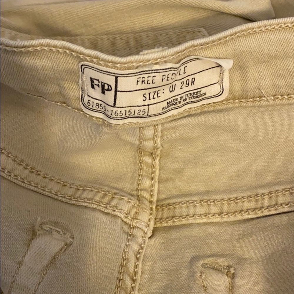 Busted knee skinny jeans